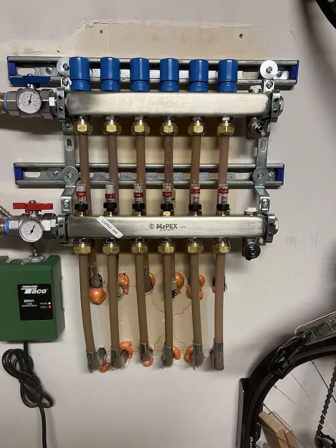 Plumber performing Water Heater Repair at a residential property in Joplin